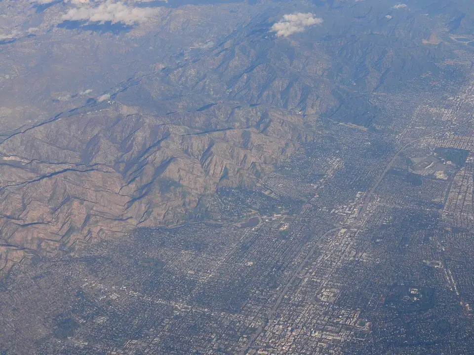 Aerial view of Pasadena with the San Gabriel Mountains behind it